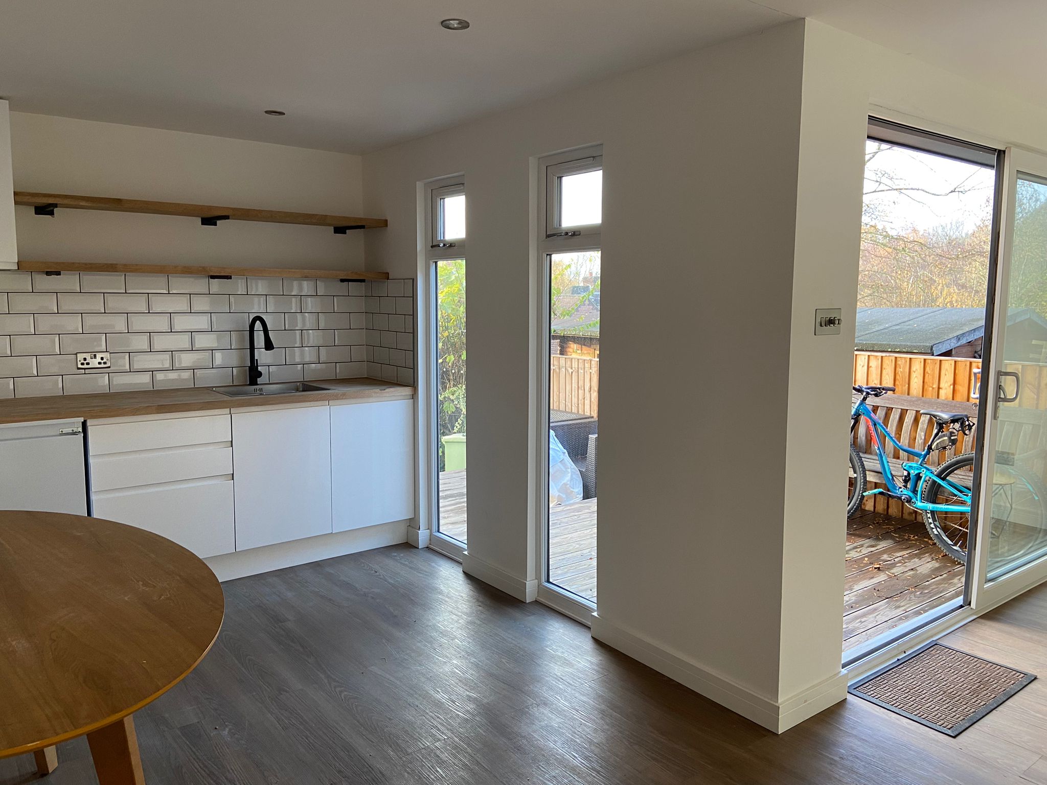 Modern garden room interior with kitchen facilities